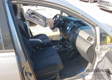 2010 Nissan Versa 1.8Sl z USA, uszkodzony, nr VIN 3N1BC1CP2AL418677